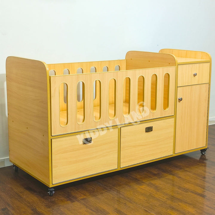 baby cot with changing station