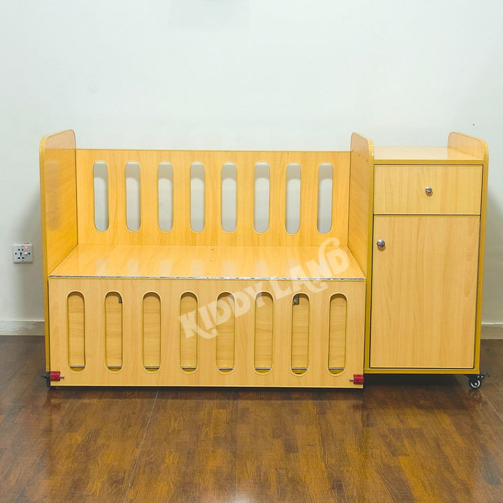 baby cot with nappy changing